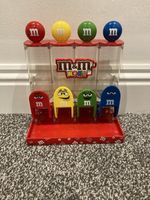 M&M's World Four Tube Red Candy Dispenser 4 colors Red, Yellow, Green, Blue