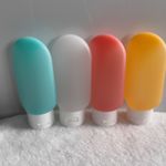 4 Pack Silicone Travel Bottles Refillable Squeeze Toiletry Containers + Bag