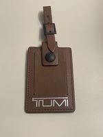 NEW TUMI Brown Leather Luggage Name Tag w/ Adjustable Buckle   NEW W/OUT TAG