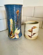 A pair of Vintage hand paired studio pottery vases