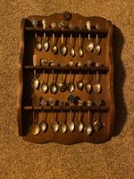 24 Collectable Spoons Rack. Two Sterling Silver Spoons Included