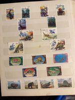 Lot of 9 Pages Thematic Stamps Animals Dinosaurs Marine Life Dogs CatsCollection