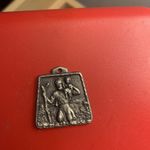 intage silver-tone St. Christopher pendant medal.