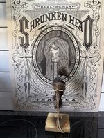 Shrunken head hand made ecuador, animal skin and hair on stand Tsantsa No11