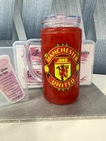Manchester united 16oz handled red cat eye snowglobe with straw.