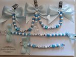 Trio Pram Charm With Matching Dummy Clip And Nappy Bag Keyring