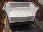 Tutti Bambini Cozee Bedside Crib With Rockers And Sheets and matress