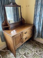 Antique solid oak carved chest of drawers with swing mirror dressing table