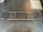 Genuine antique chrome plated brass bath rack. Adjustable arms extend to fit.