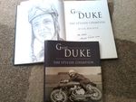GEOFF DUKE * SIGNED* TO 'PETER', 'THE STYLISH CHAMPION BY MICK WALKER.H/B 2007