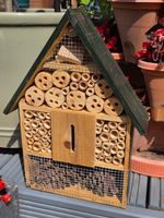 Large insect hotel. Wooden, painted green roof. New. Boxed.