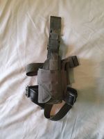 Olive drop leg pistol holster for Airsoft/Paintball, opened never used