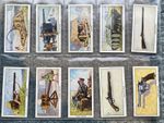 ORIGINAL  SET OF TEOFANI, PAST & PRESENT, WEAPONS OF WAR, ISSUED 1938, SET OF 24
