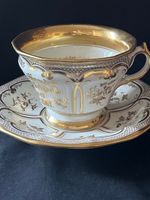 Large Memorial confession cup and saucer, 24 carat gold plated (1861) marked KPM