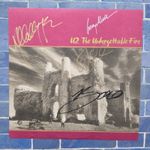 U2 | signed lp  | 4 members | The Unforgettable Fire,