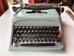 Olivetti Studio 44 In Teal/Blue. Working But Will Need Ribbon.