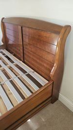 French Sleigh Bed with sprung slat base, low end. Cherry wood.