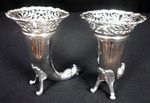 A very attractive pair of solid silver vases, Goldsmiths & Silversmiths Co. Ltd 