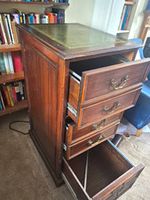 Filing Cabinet ​Description: Filing cabinet, with green leather inlaid top.