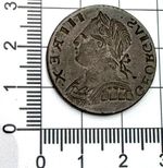 X620: 1770-75 George III Copper Halfpenny - a spectacular obverse BROCKAGE