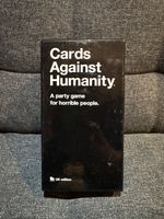 Cards Against Humanity UK Edition. A party game for horrible people