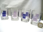 4 SMALL GLASSES, LIGHT & DEEP PURPLE HANDPAINTED SQUARES ON EACH SIDE.