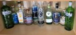10 Empty Gin Bottles for Recycling Rinsed and dried out.