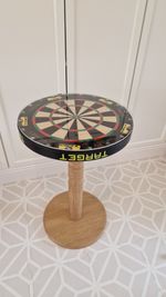 Dartboard Table- European oak dart barrel leg and Target Tor Dartboard.