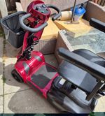 iCAN Mobility 4-Wheeled Electric Scooter Red Basket Armrests Swivel Seat