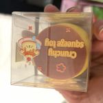 Crunchy Tactile Squeeze Toy Yellow Brown Squishy in Clear Box Packaging