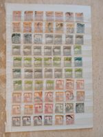 Collection of old stamps of  the Middle East on 11 stockbook sides