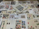 World stamps inc South Africa etc. Mixed lot. Ex dealer leaves M/U 1.8kg G86