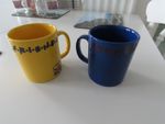 2 friends mugs. good condition. 1 yellow,  1 blue.