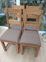 4 Solid Oak Dining Chairs in good condition with New seat pads.Free local del.