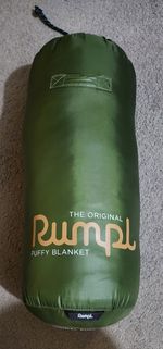 The Original Rumpl Puffy Blanket. 52" x 75". New. No Tags. Green.