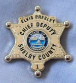 Elvis Presley ' Chief Deputy Shelby County ' sheriff badge. Gracelands, TCB