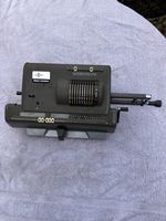 1960’s hand-cranked Nippon Calculating Machine HL-21 with Explanation Manual.