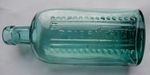 Dark aqua oval poison bottle with mould faults c1910-20's