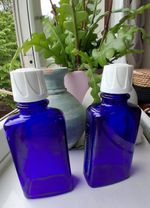 2 x cobalt blue glass original 100ml WELEDA Bottles for reuse.