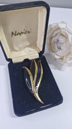 Napier Black enamel and gold plated leaf brooch Boxed