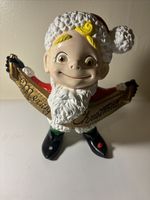 Ceramic Christmas elf figurine with 'Merry Christmas' banner by Atlantic Mold