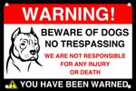 Beware of the dogs no trespassing! we are not responsible for any injury dog