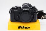 Nikon FE2 Auto/Manual black SLR. MINT- cond. +strap+half case. Titanium shutter!