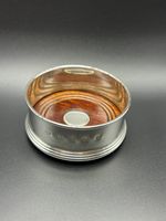 1976 Large Sterling Silver Champagne/ Wine Bottle Coaster - stained oak base