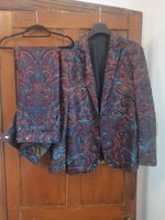 DENT de Man suit. Glass Animals stage wear.