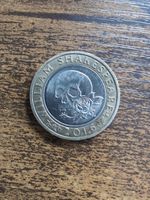 Shakespeare 2 British Pound Coin. Misalignment in minting scull