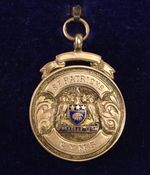 9 Carat Gold Sports Medal Fob Blue Enamel Detail Owen Shield 1928-9 6.4g - EHB
