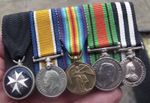 A PERIOD MINIATURE WW1 PAIR, WW2 DEFENCE & ST. JOHN AMBULANCE MEDAL GROUP.