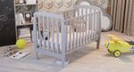 Baby Cot with a mattress. Beautifully designed, wooden, made eco friendly.