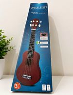 Acoustic 4-String Brown Ukulele Set, 17 Frets, Pick & Instruction Book